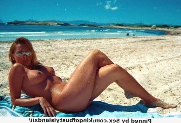 Laying Naked On the Beach
